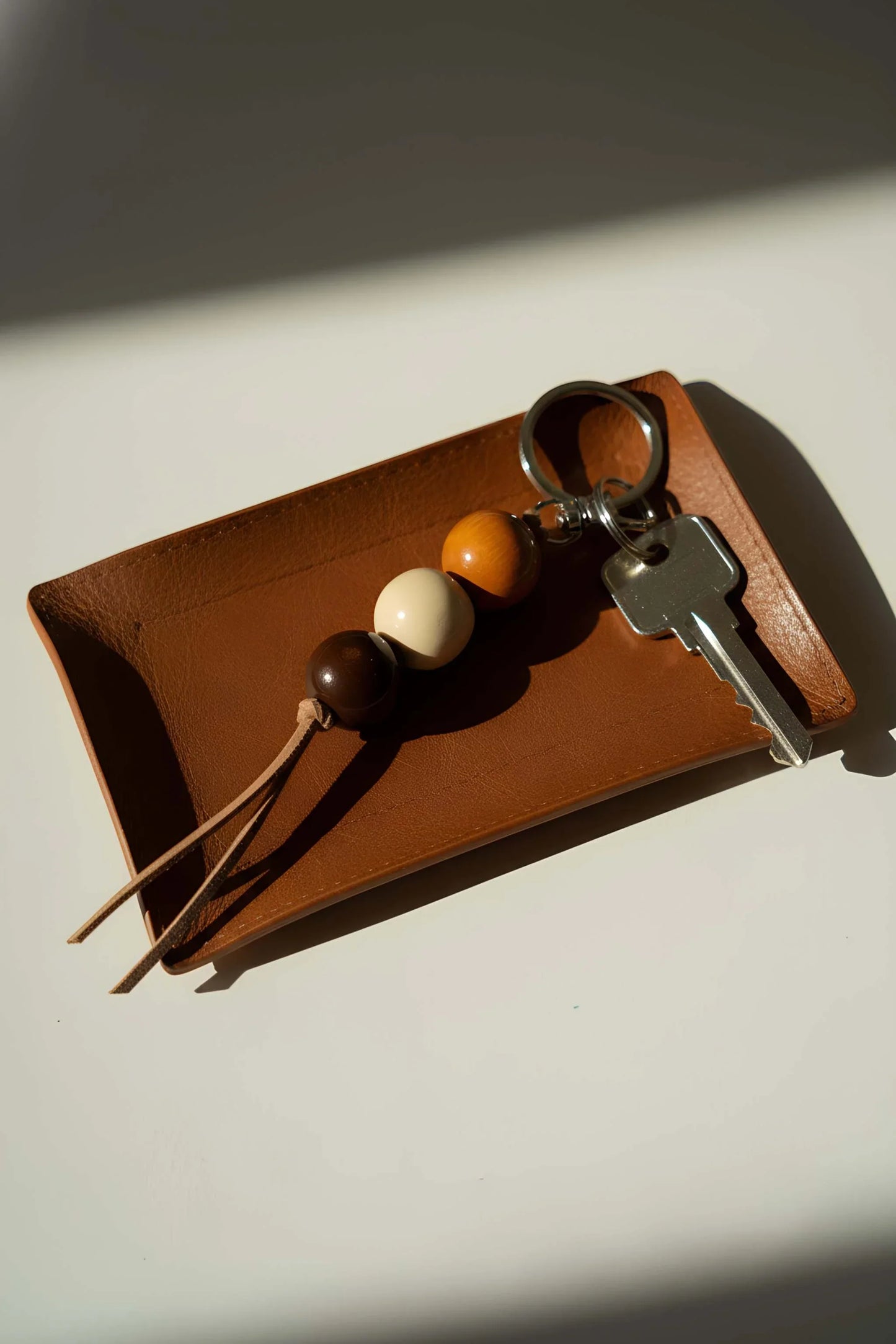 Handmade Ceramic Keychain with Dark Brown Beads