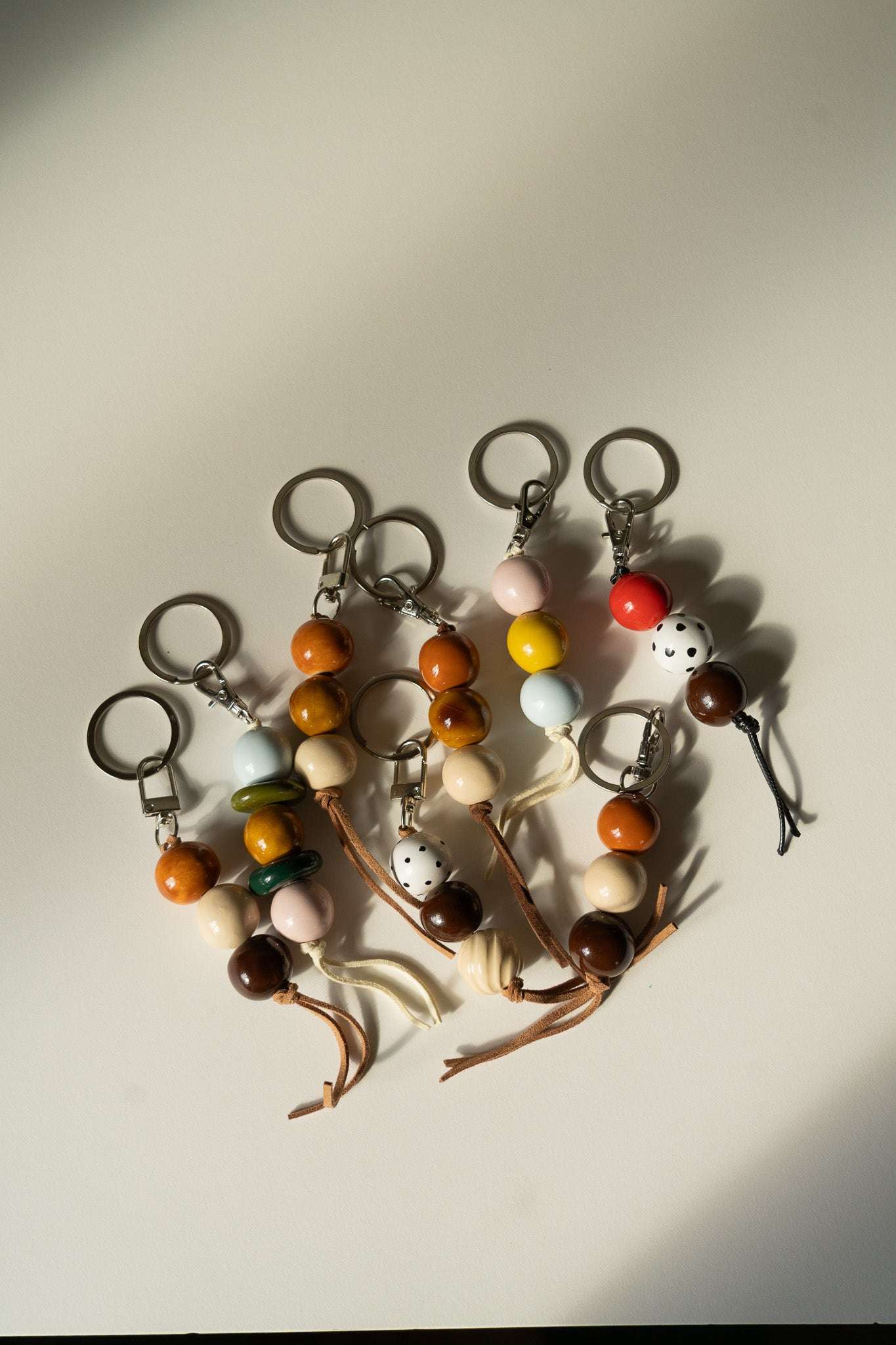 Handmade Ceramic Keychain with Dark Brown Beads