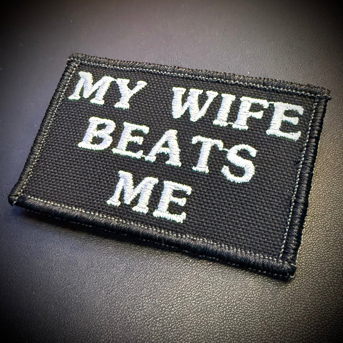 My Wife Beats Me Funny Embroidered Morale Patch, 2x3" | VELCRO® Brand Hook Backing