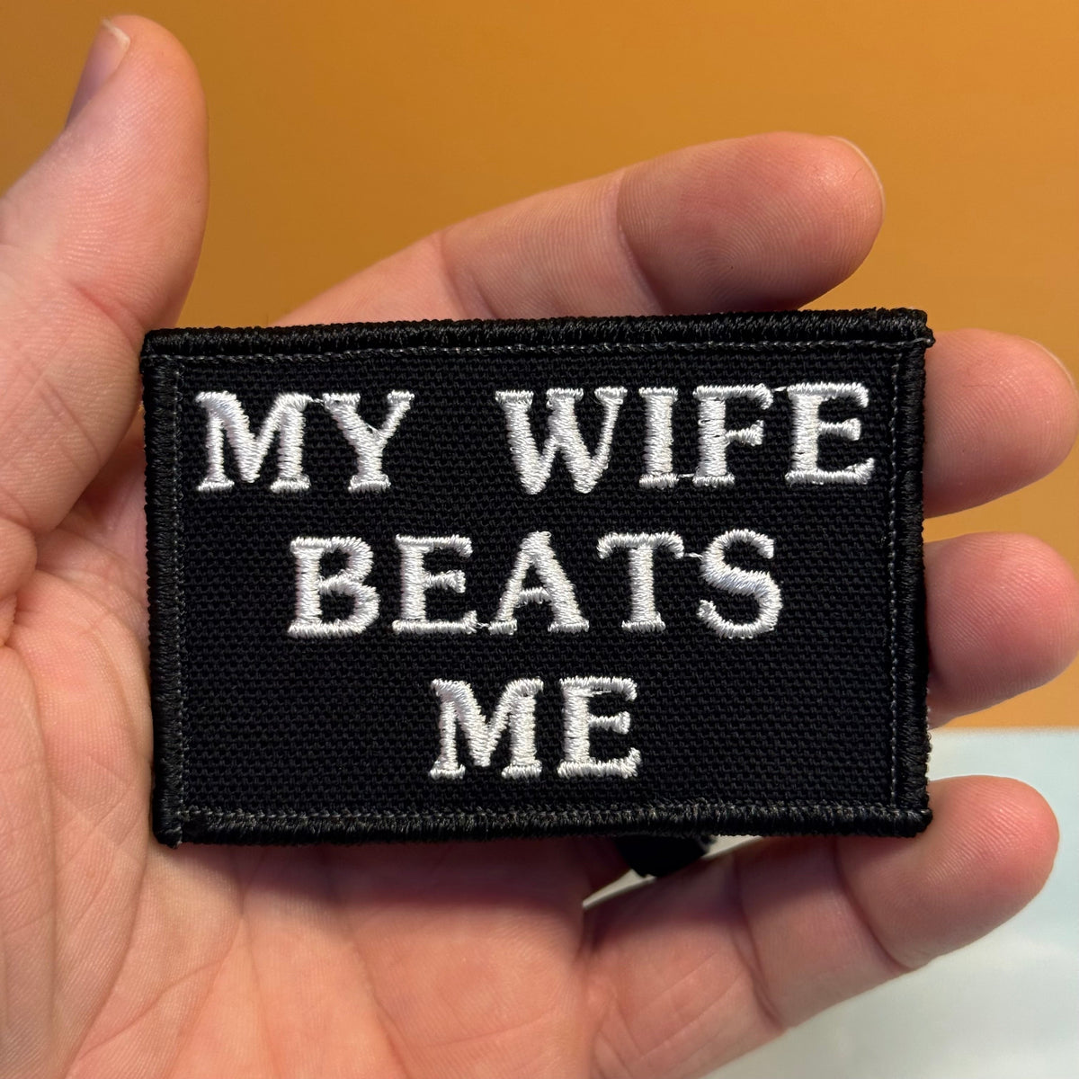 My Wife Beats Me Funny Embroidered Morale Patch, 2x3" | VELCRO® Brand Hook Backing