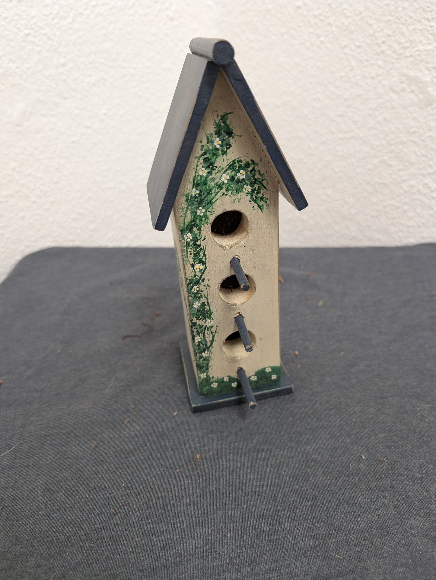 Vintage handcrafted three post tall birdhouse